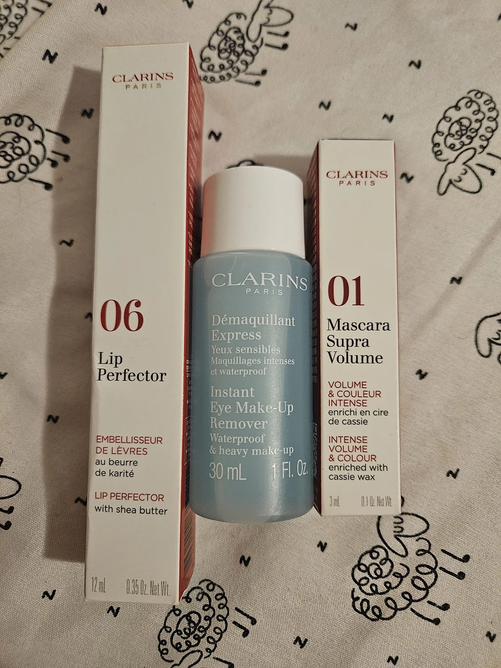 Clarins Lip Perfector 06 Rosewood Shimmer and Makeup Remover Mascara